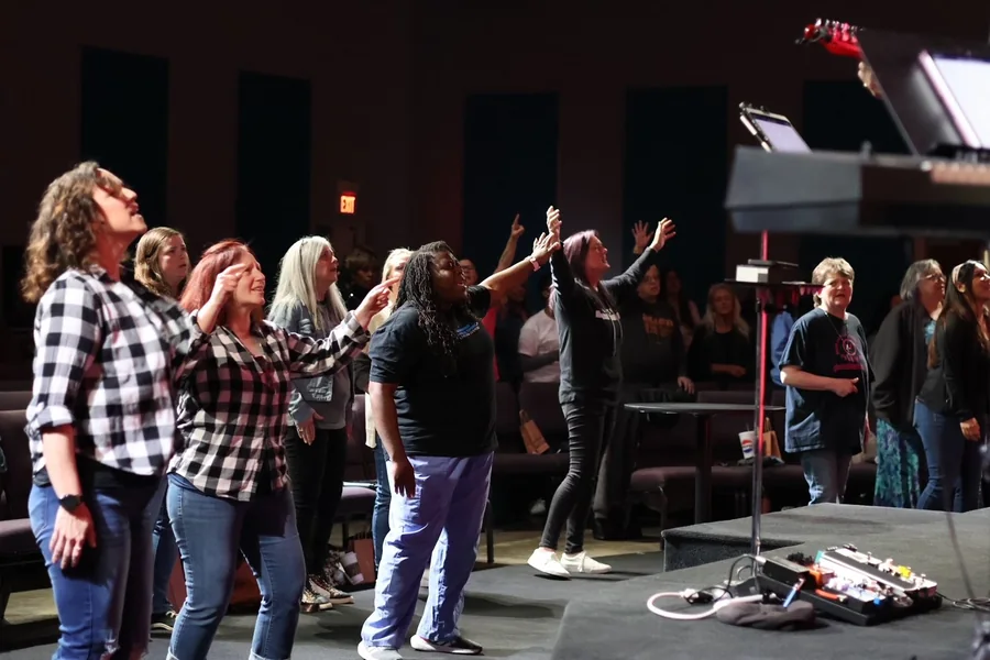 Members of Glorious Bible Church worshiping together
